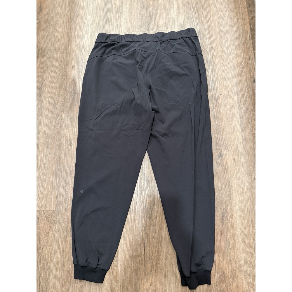 Lululemon On the Fly Jogger Luxtreme Black Pants Womens 12 Workout Train LW5CPJS